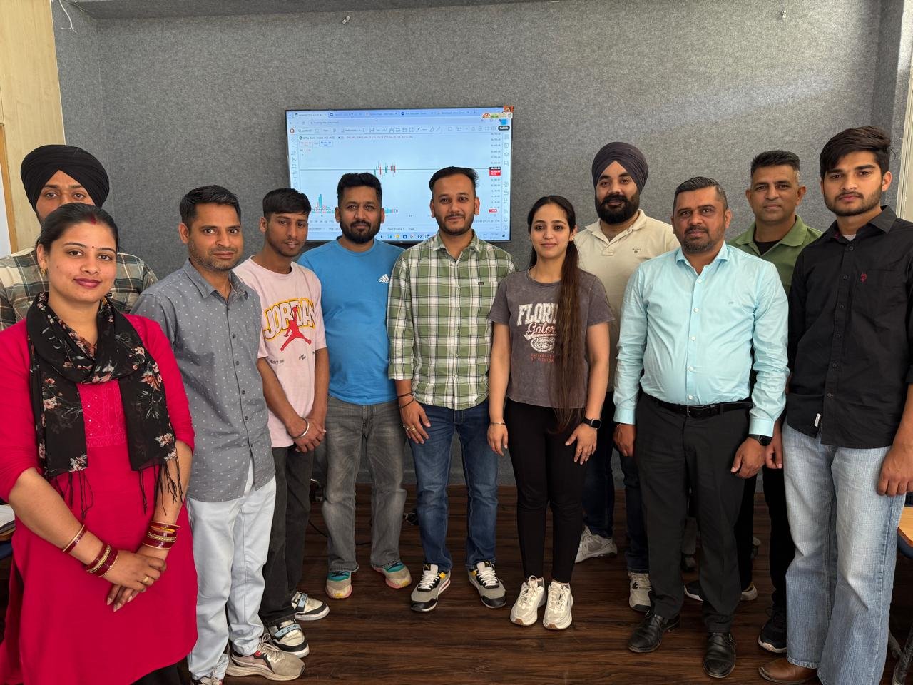 doon trading academy chandigragh branch batch for master course of stock market , people standing