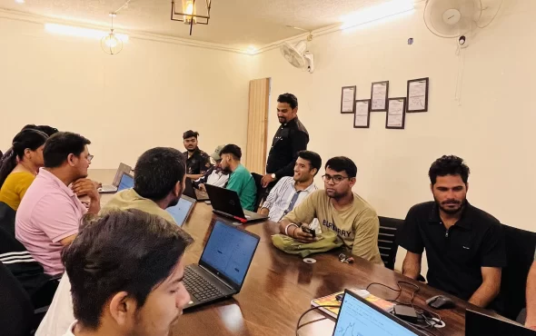 image of all the students sitting in the trading cafe