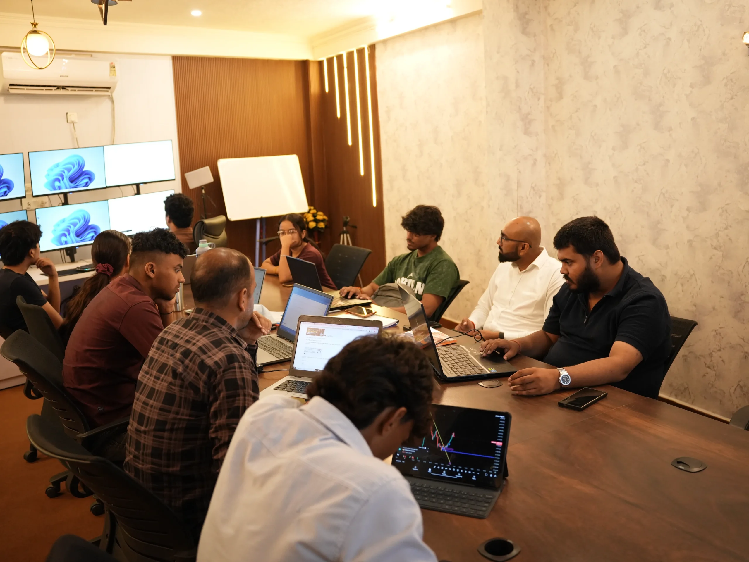 A mentor working with students at the Dehradun campus