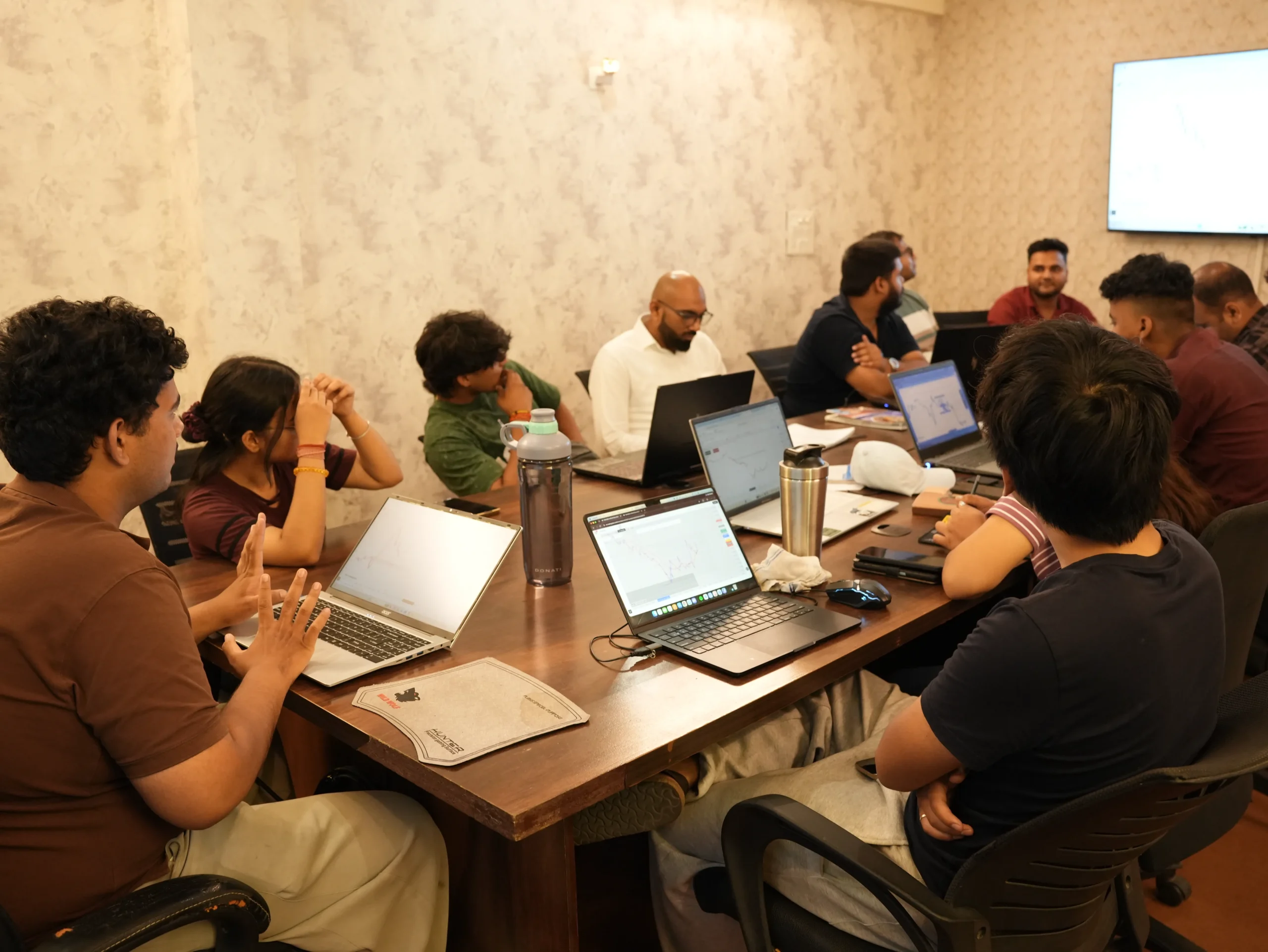 Students in a . trading session at the Doon Trading Academy Dehradun campus